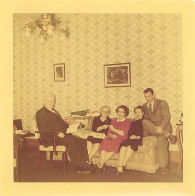 Personal Photos; Two men and three women all sitting