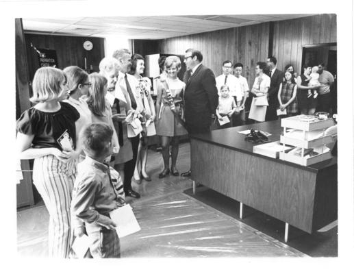 WKYT Television; Everyone lined up around a desk