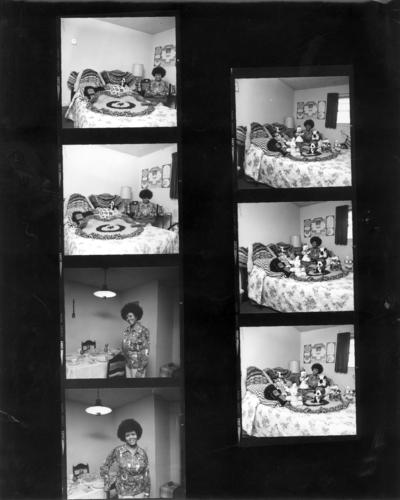 Women; Individual; Unidentified; Seven photos of a woman in her house #1