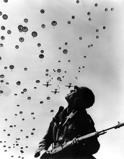 Planes, Helicopters, and Parachutists; An airborne parachutist