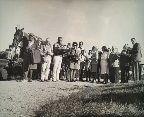 Horses; Winner's Circle; #6 receives the trophy