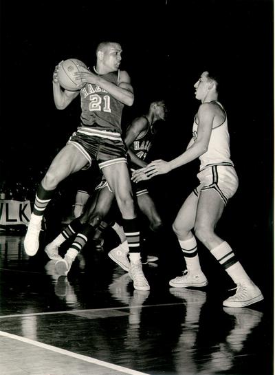 Basketball; Kentucky High School; Hazard's #21 stretches to keep his pivot foot on the ground