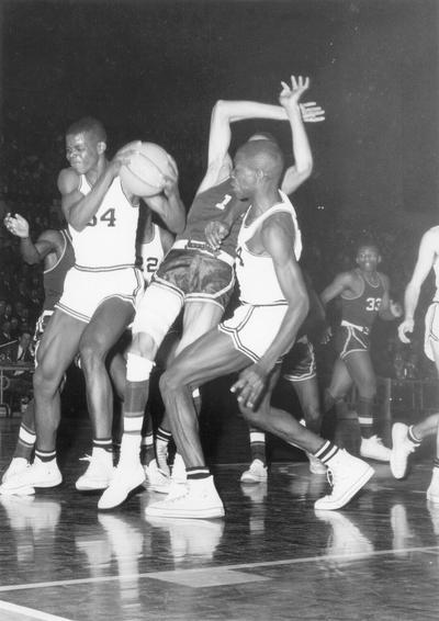 Basketball; Kentucky High School; #34 knocks over his opponent