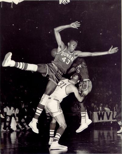 Basketball; Kentucky High School; Dunbar's #43 goes over the back of his opponent