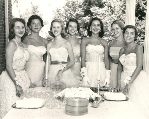 Beauty pageants; Group of seven women at a table