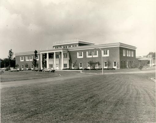 Buildings; Unidentified; A large two-story facility with columns and horseshoe driveway