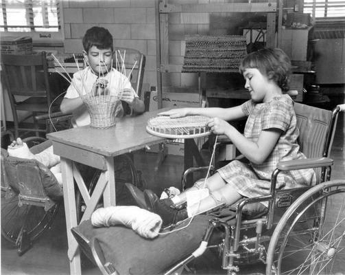 Cardinal Hill Hospital; Young Children construct wicker baskets at physical therapy