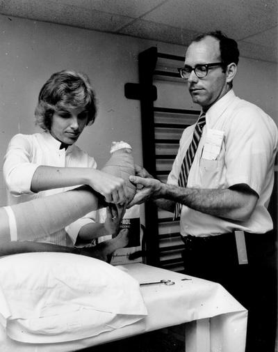 Cardinal Hill Hospital; Doctor and nurse examine cast