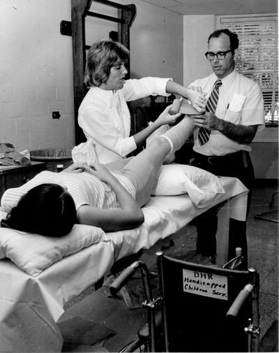 Cardinal Hill Hospital; Doctor and nurse wrap leg cast