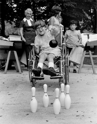 Cardinal Hill Hospital; Young patient in a wheelchair bowling