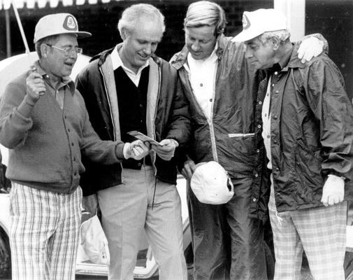 Carroll, Julian M.; Governor Carroll and his associates check a score card