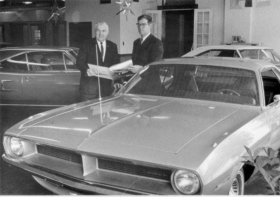 Cars and Other Vehicles; A Plymouth on the showroom floor