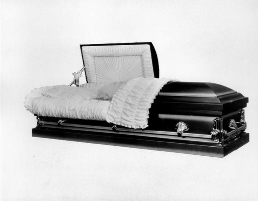 Caskets; Wooden casket with white lining