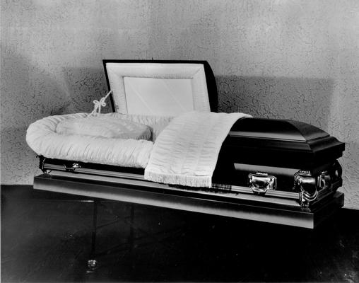 Caskets; Black buffed casket with textured background