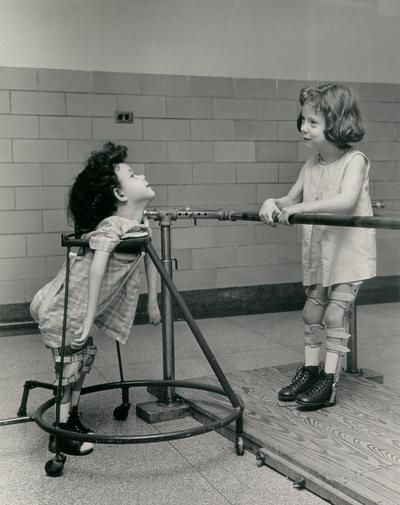 Children; In the Hospital; Two girls share a laugh at physical therapy