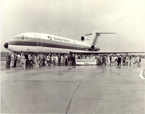 Christian Churches of Kentucky; A large group from the Christian Church is met with a banner at the Dallas Airport