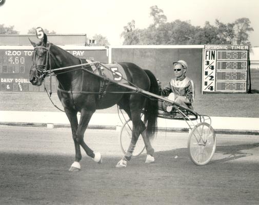 Dancer, Stanley; Dancer and horse leaving the track