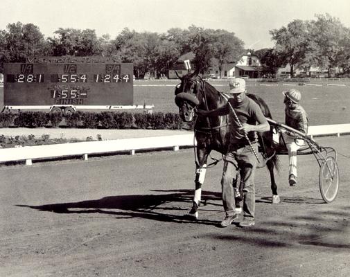 Dancer, Stanley; Dancer and his horse being escorted