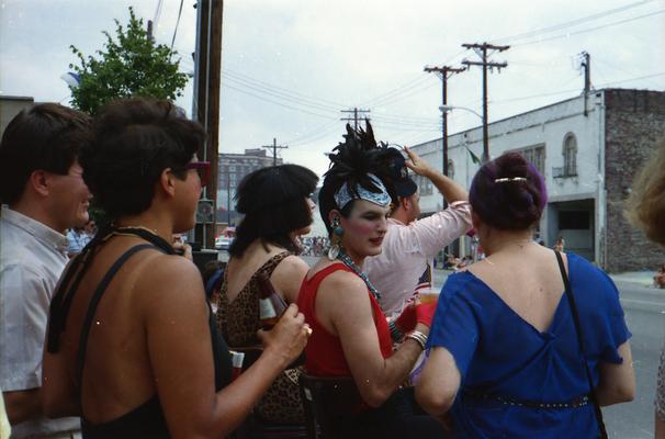Group of parade watchers at the Lexington Fourth of July parade, some in costume