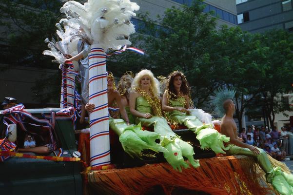 Cafe LMNOP parade truck, Drag mermaids and mermans, parade watchers at the Lexington Fourth of July parade