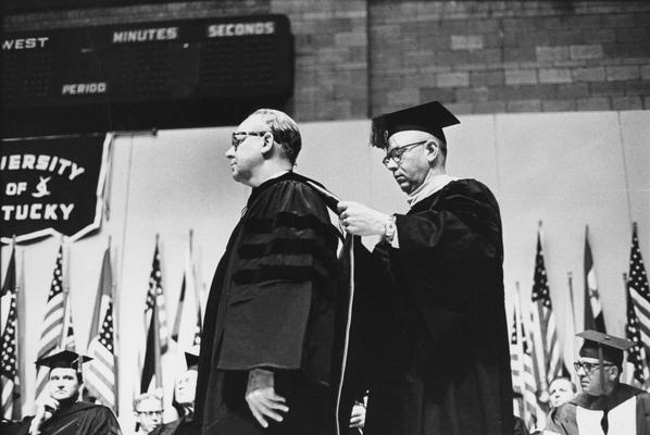 Cook, Donald C., pictured receiving honorary degree, Public Relations Department