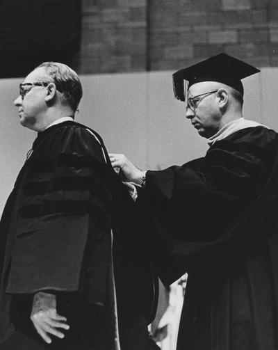 Cook, Donald C., pictured receiving honorary degree, Public Relations Department