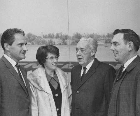 Creech, Glenwood L., Alumnus, B.S., 1941; M.S., 1950, Vice President of University of Kentucky Relations and Professor of Extension Education, Research Specialist in Vocational Education, 1965 - 1973, President of Florida Atlantic University, 1973 - 1983, pictured left with three unknown individuals, photographer: Lexington Herald - Leader Staff