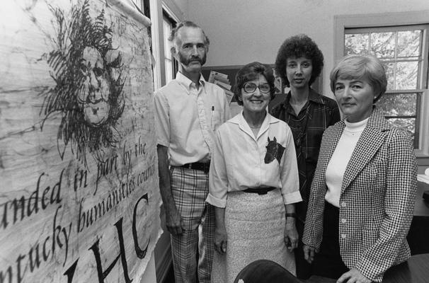 Curtis, Arthur Edward, Executive Director, Kentucky Humanities Council, pictured left with three unidentified individuals, University Information Services