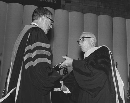 Dawson, Robert Randall, Student, 1921 - 1925, pictured right receiving honorary degree (Sc. D., 1972) from President Otis Singletary, President of R. R. Dawson Bridge Company of Bloomfield, Kentucky