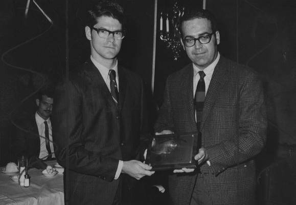 DeAngelis, Robert, Professor of Metallurgy, Mining Engineering Department, pictured right with T. E. Isaacs