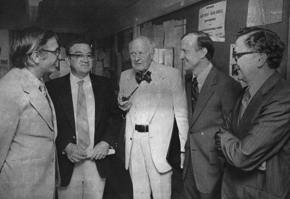 DeMarcus, Wendell C., Professor, Physics Department, University Information Services photograph, pictured (second from left) with Samuel F. Conti (far left), Lars Onager (center), Nobel Prize winner in Chemistry, and two unidentified individuals