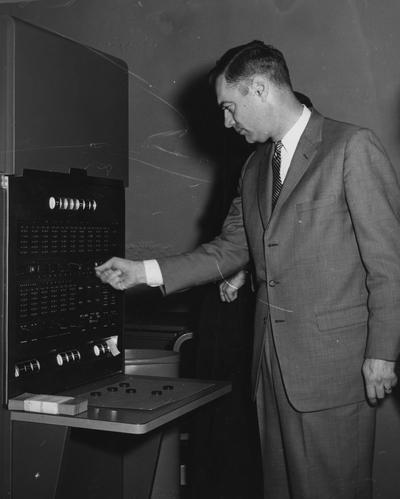 Dickey, Frank G., President, University of Kentucky, 1956 - 1963, Dean, College of Education, pictured at the Computing Center, November 1958, Public Relations Department