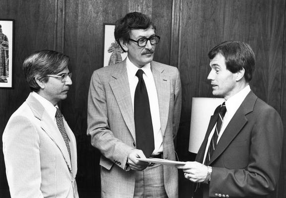 Eichhorn, Roger, Professor of Mechanical Engineering, Dean, College of Engineering, pictured (center) with two unidentified individuals