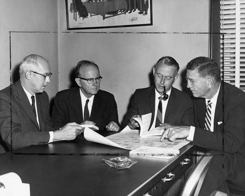 Field, Thomas, Professor, Geography Department, pictured third from left with two unidentified individuals and President A. D. Kirwan (far right)