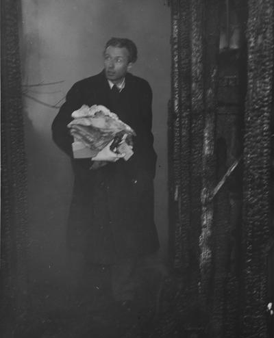 Fowler, Frank, Professor of Theater Arts, Director of Guignol Theater, pictured at Guignol Theater fire, February, 1947, Photographer W. E. Sutherland