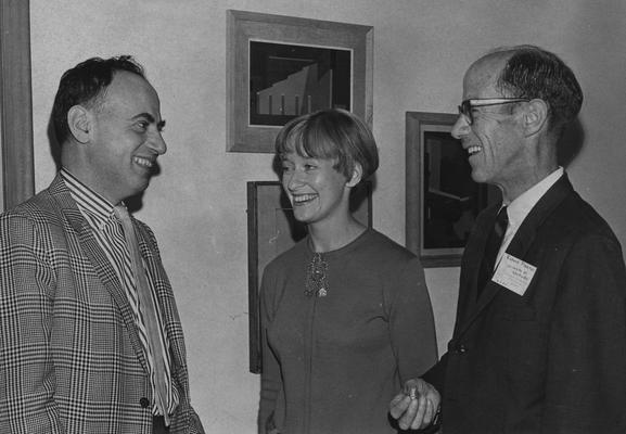 Freeman, Richard B., Professor, Art Department, pictured (far right) at an art conference, Lexington Herald - Leader staff photograph