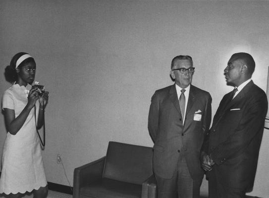 Ginger, Lyman Vernon, Dean, College of Education, 1956 - 1967, Superintendent of Instruction for Kentucky, President of Kentucky Education Association, President and Treasurer of National Education Association, Alumnus, Master of Arts, 1942, Ed.D., 1950 pictured with Ullosia (?) Tate and Horace Tate at the Georgia (?) Teachers Association, April 1969