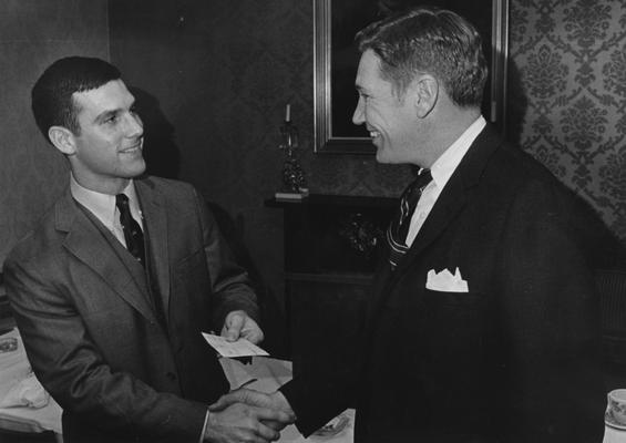 Graeter, Don C., Alumnus,1969, pictured (left) with Robert E. Lee of Ernst and Ernst of Louisville presenting an award, Public Relations Department