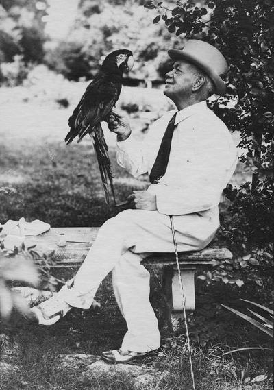 Anderson, F. Paul, Dean of Mechanical Engineering, 1892 - 1918, Dean of Engineering, 1918 - 1934, birth 1867, death April 8, 1934, Anderson with large parrot on his finger