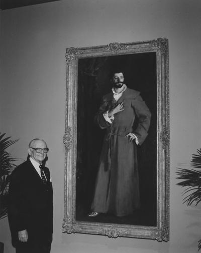Hammer, Armand, Poses with Sargent's 