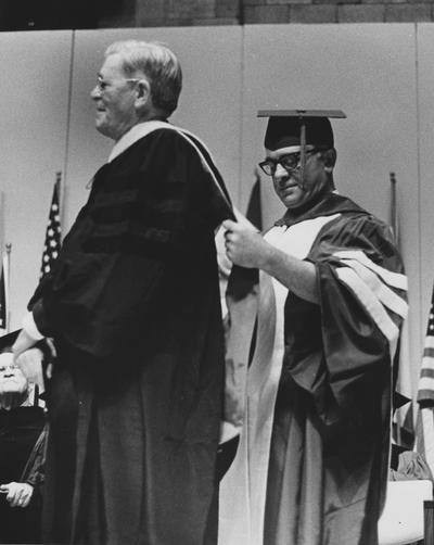 Massie, Dr. Francis, pictured receiving Honorary Degree from Dr. Ralph Angelucci / Trustee