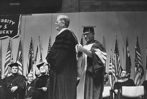 Massie, Dr. Francis, pictured receiving Honorary Degree from Dr. Ralph Angelucci / Trustee