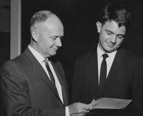 Mullins, John Stephen, pictured receiving Harry and Bullock J. Award from Professor M. K. Marshall, from Public Relations Department