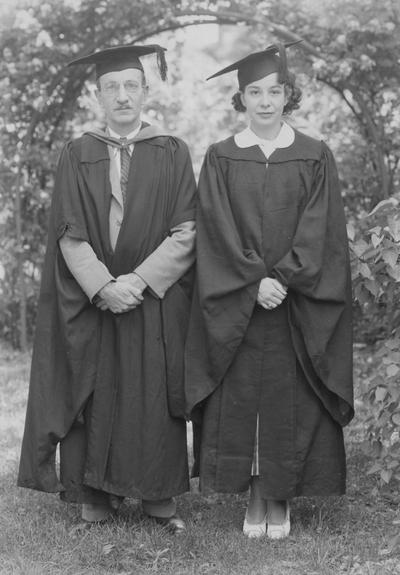 Nollau, Louis, pictured with her daughter Hazel at her Commencement ceremony