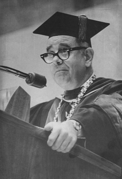 Oswald, John W., President at the University of Kentucky 1963-1968, pictured speaking at graduation ceremonies