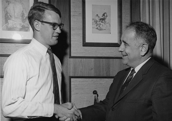 Oswald, John W., President at the University of Kentucky 1963-1968, pictured with student, William N. Eigel, III