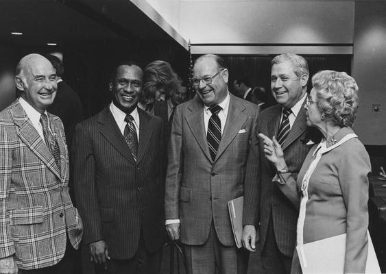 Blazer, Lucille, Member of Board of Trustees, 1967 - 1974, Secretary of the Board of Trustees and Chairman of the Medical School Committe,e Spouse of Rexford Blazer, pictured with (from left) Albert Clay, unidentified man, William Sturgill, Richard Cooper, Photographer: University Information Services