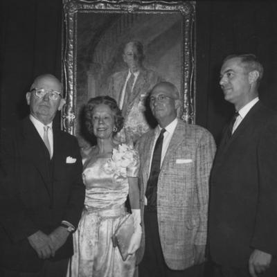 Peterson, Frank Dewey, Vice President of Business Administration, pictured with wife at a portrait presentation