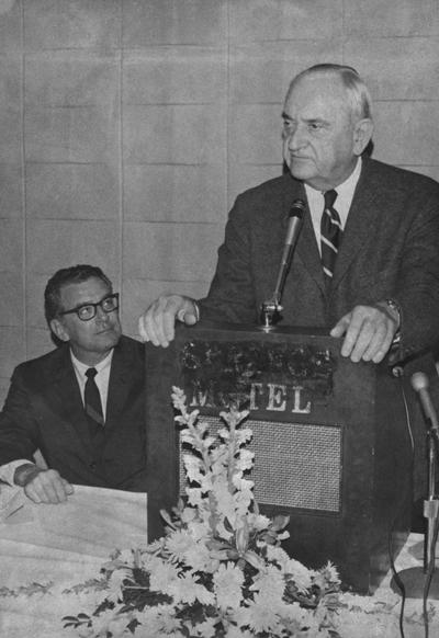 Rupp, Adolph, University of Kentucky Basketball Coach 1930-1971, giving a speech to campus crusaders, pictured with President Singletary