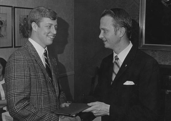 Schulte, Gregg, pictured receiving the 